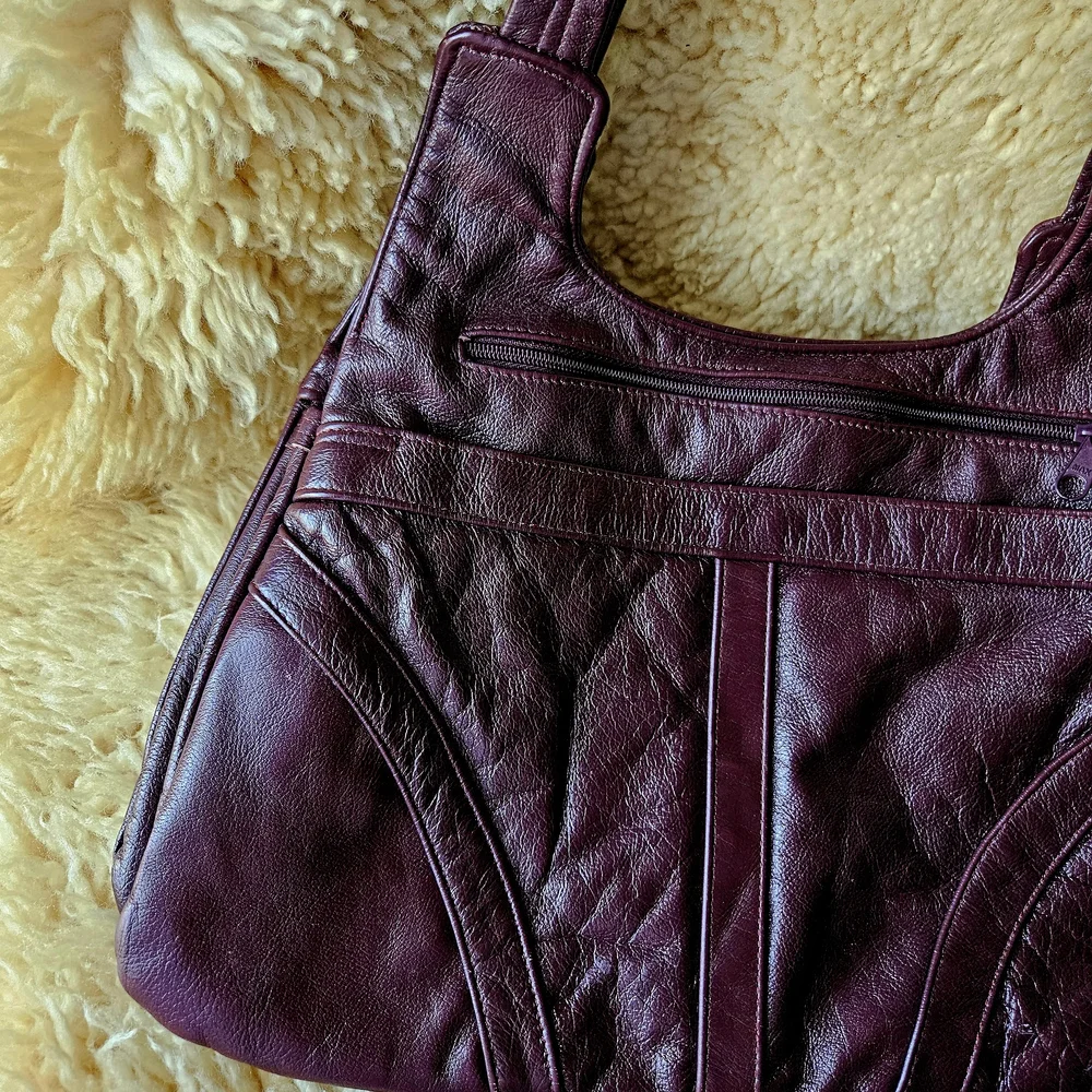Elegant Early 1980s VINTAGE Burgundy Leather Satchel bag